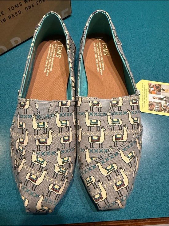 Toms Shoes - TOMS Grey llamas Canvas Slip-On with Patterned Trim